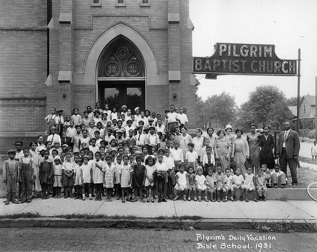 Parishioners outside of Pilgrim Baptist Church. Caption: Pilgrim's Daily Vacation Bible School 1931
